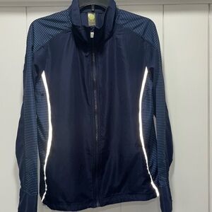 Kiwi Kate size large windbreaker . Full zip . Reflective . New with tags